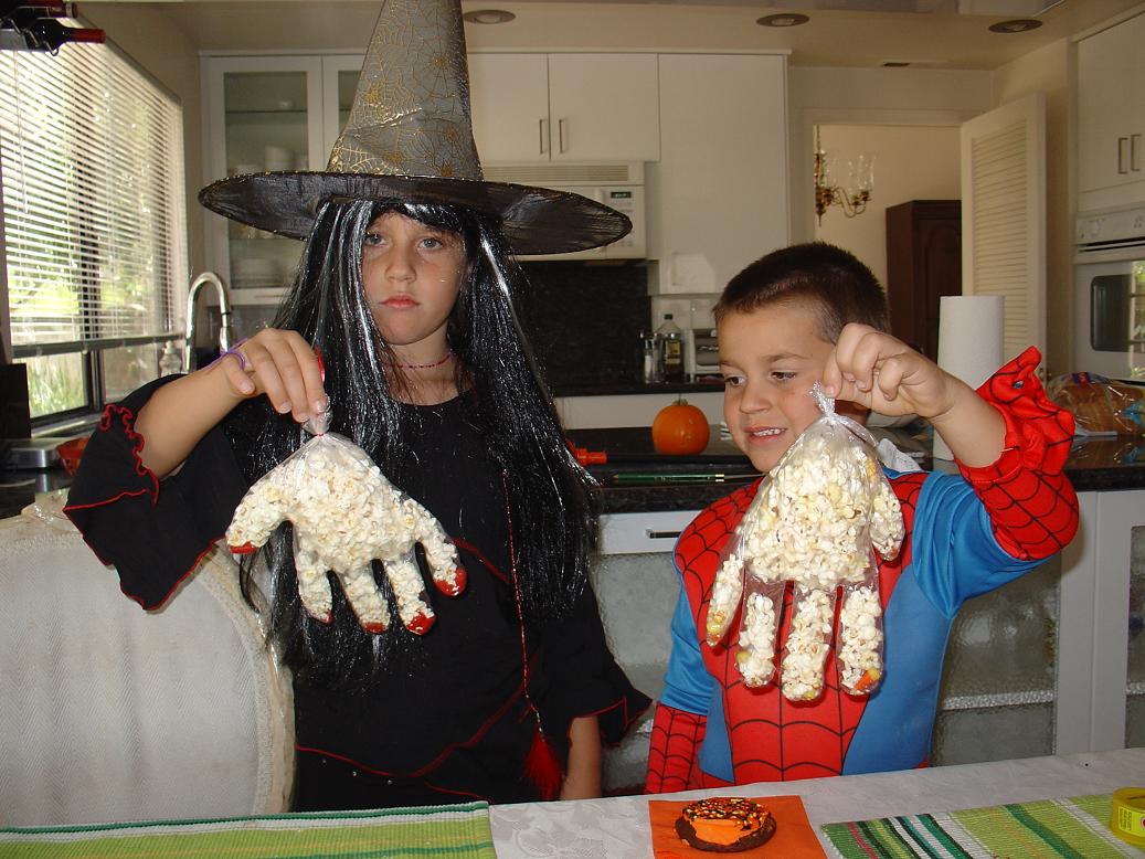 The witch and Spider man - popcorn hands.JPG
