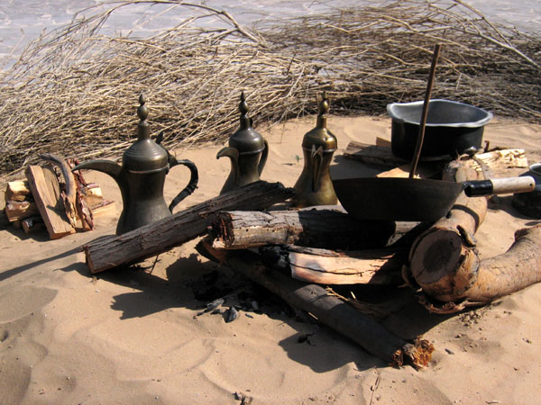 Traditional Arabic coffee being prepared over a desert style open fire, Bastakia