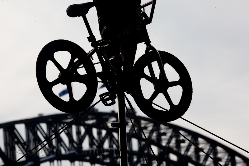 Tightrope walker with Harbour Bridge backdrop