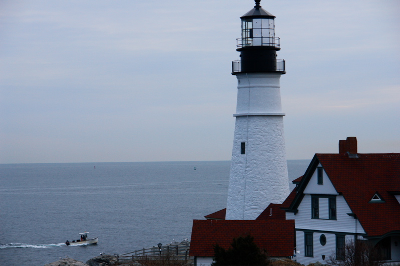 DSC00660.jpg TINY BOAT HEADS OUT FOR LOBSTER PAST THE GRAND LADY  portland head light maine