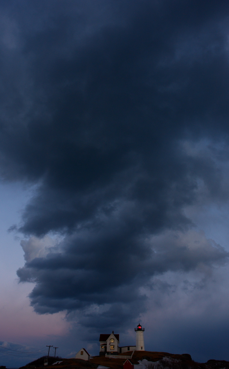 112DSC03684_2.jpg SMALL LIGHT OF HOPE in the darkness of a wild storm at Nubble lighthouse, maine