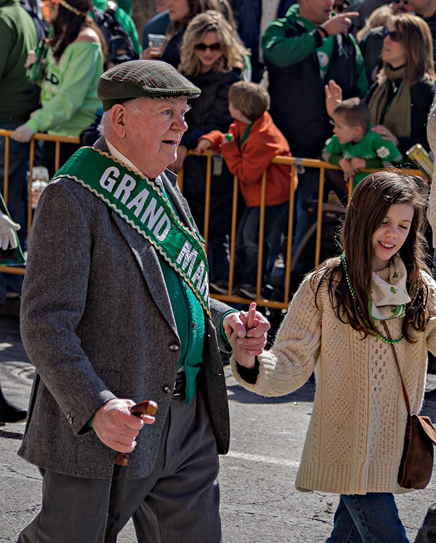 Grand Marshall from a previous year. With granddaughter?