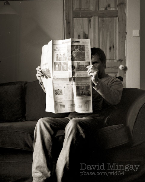 Sep 30: Man reading a newspaper