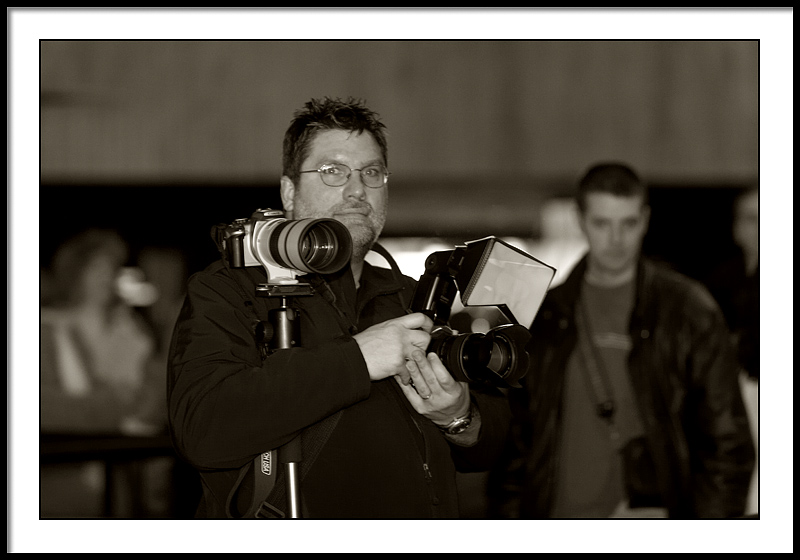 Sayer with all the cameras he carries around
