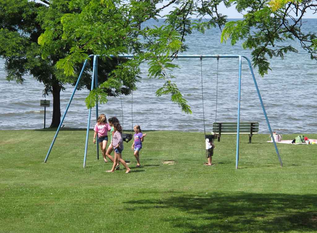 PLAYING ON THE SWINGS