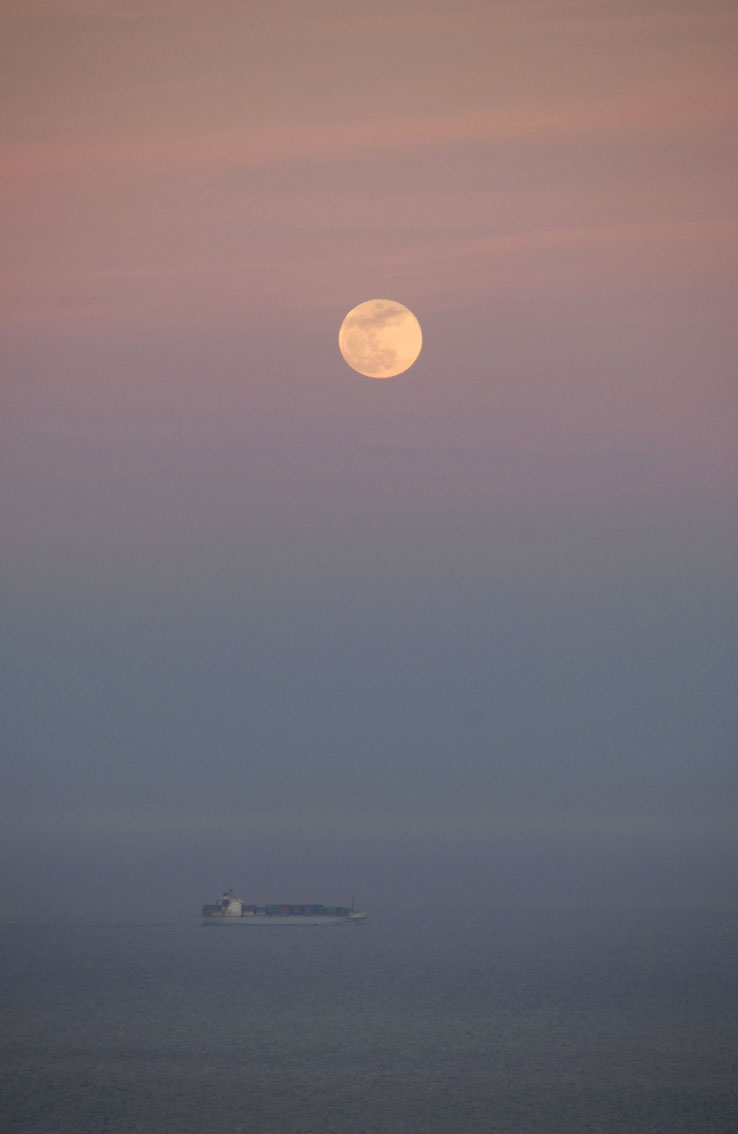 Full moon and ship