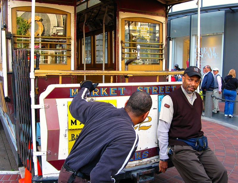Powell & Market Sts. : do you want to try to spin a cable car with your hands ?