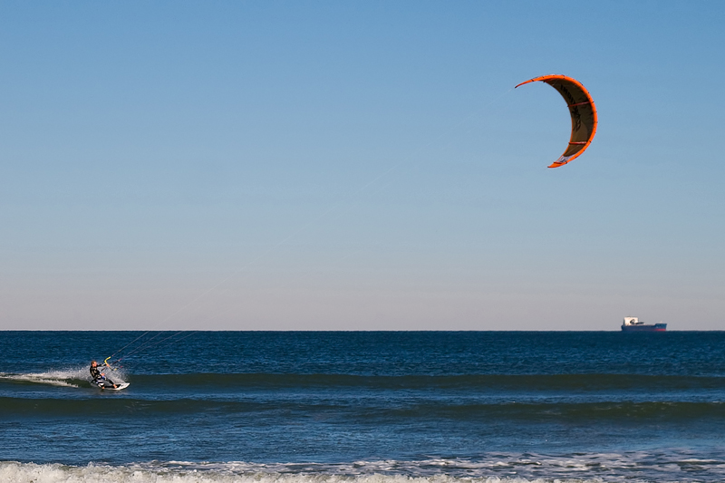 Kite Surfer and Freighter