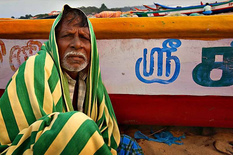 Sheltering fisherman