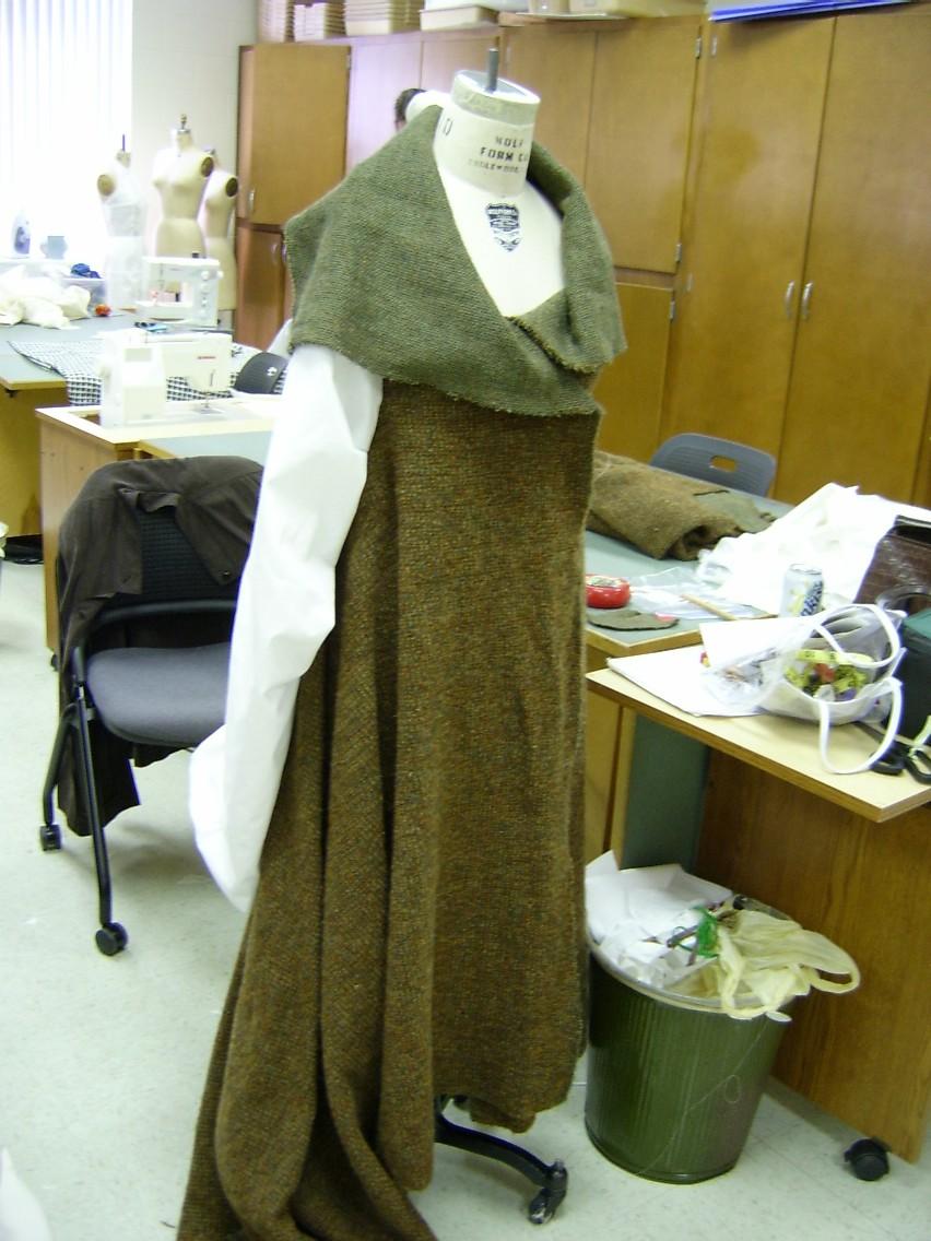 Coat on Form with Muslin Sleeve