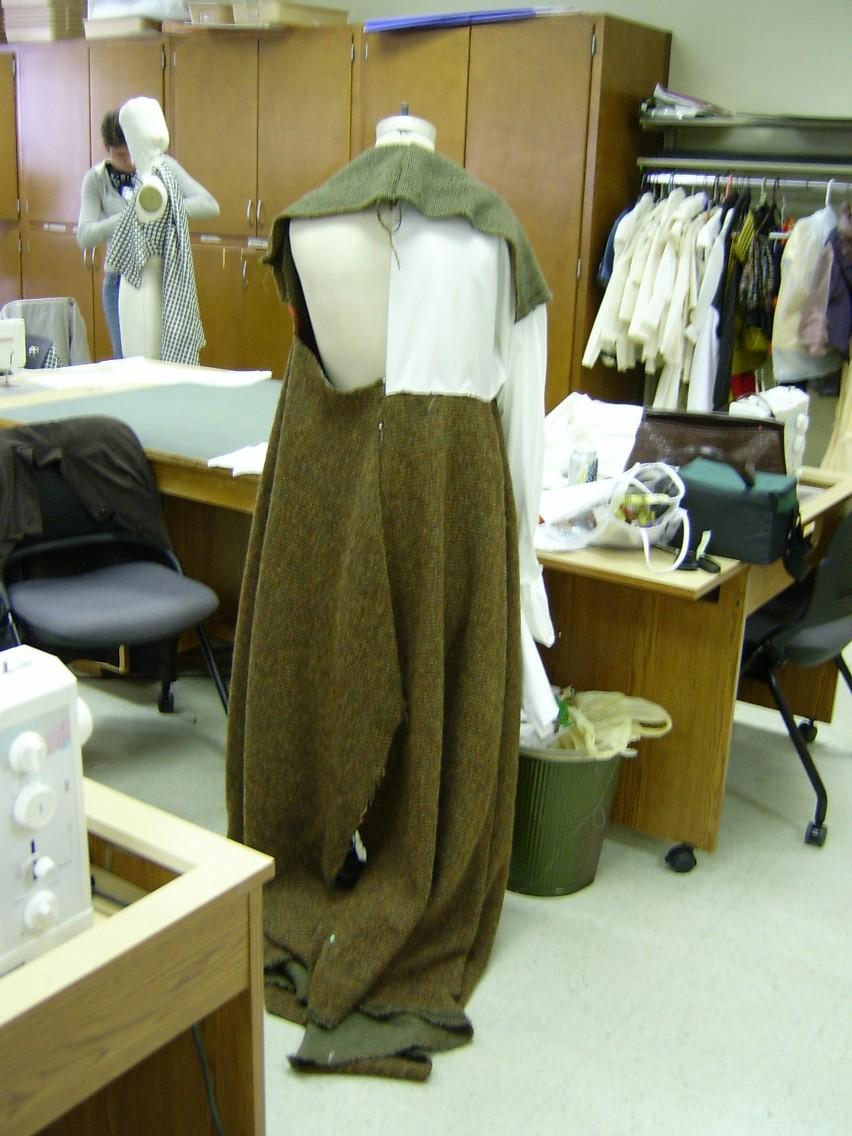 Coat on Form with Muslin Sleeve & Back