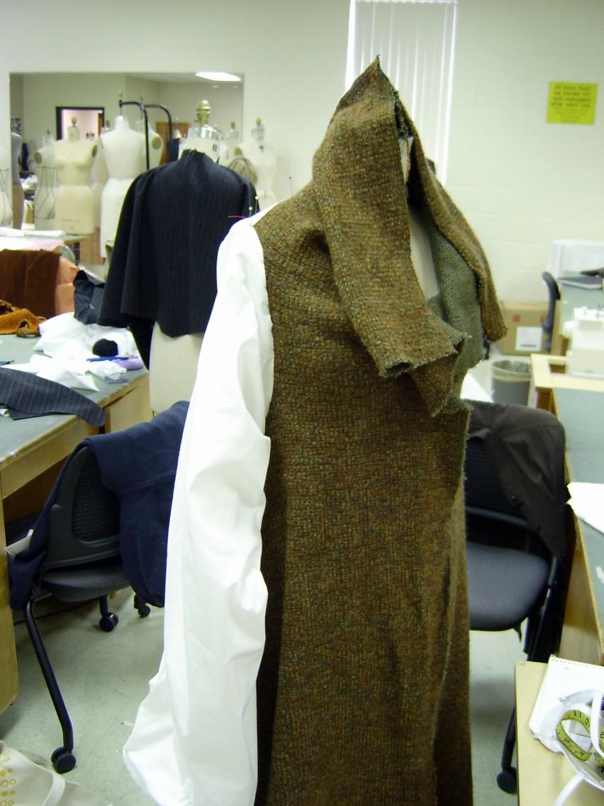 Coat on Form with Muslin Sleeve, with Collar Raised
