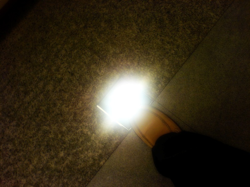 Small light at feet by Tabrizi