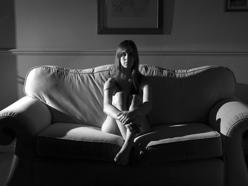 Girl on a Sofa<br>by Tony Stephenson