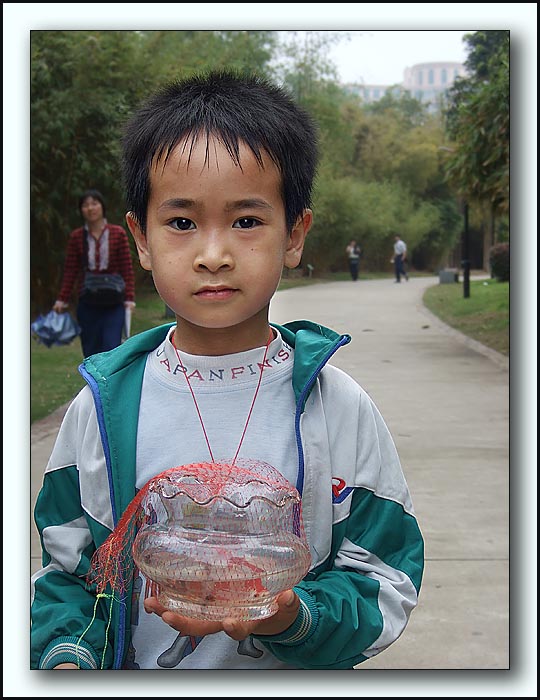 7th: Boy with Goldfish<br>by jrdu