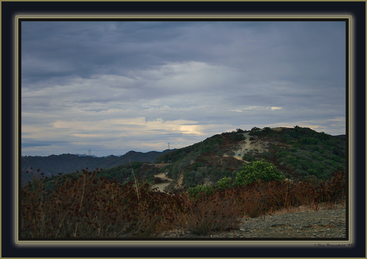 One Road, One Ridge - Two Cyclist Descend