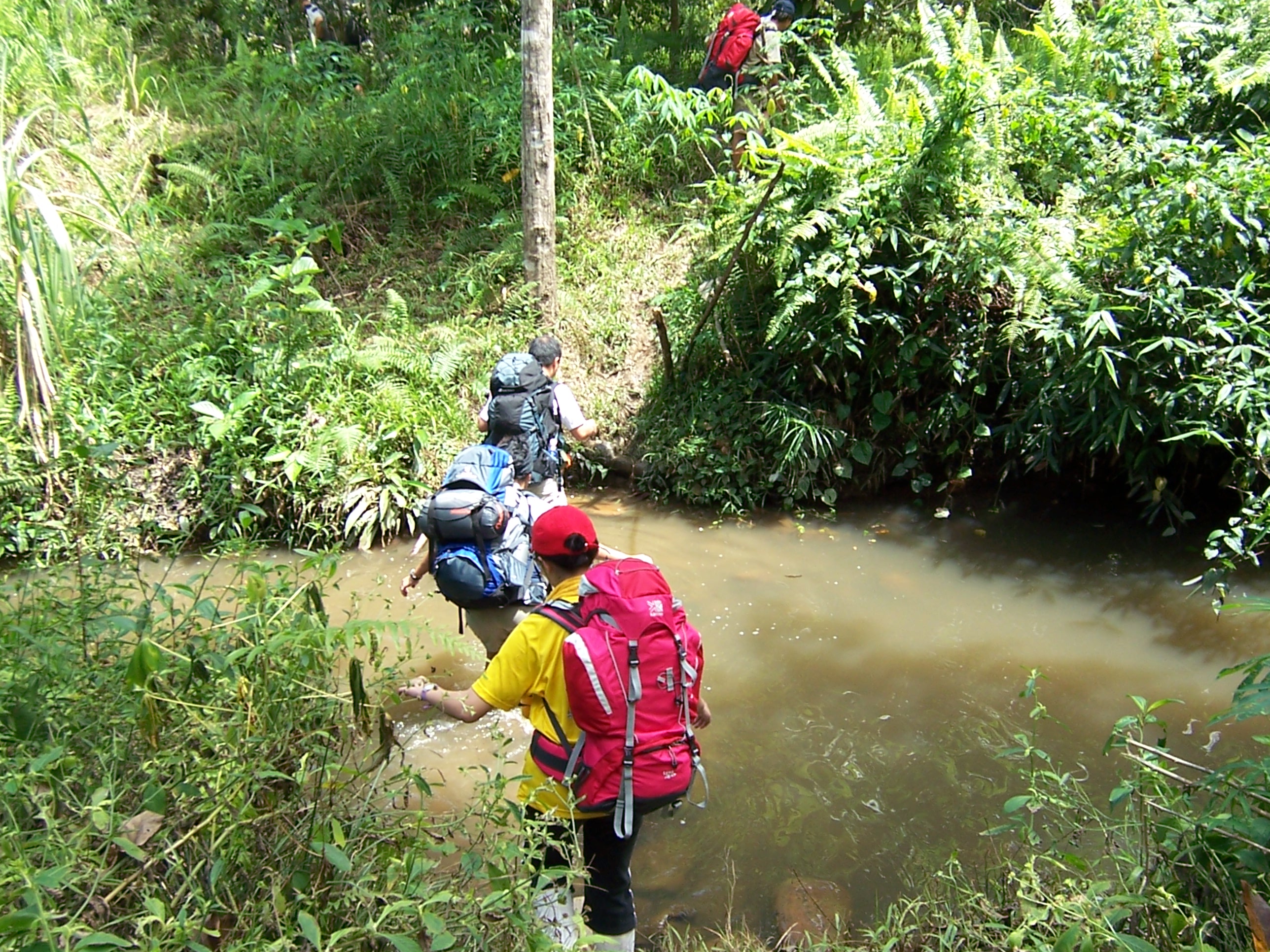 Crossing a stream at the back of the Govt quarters.