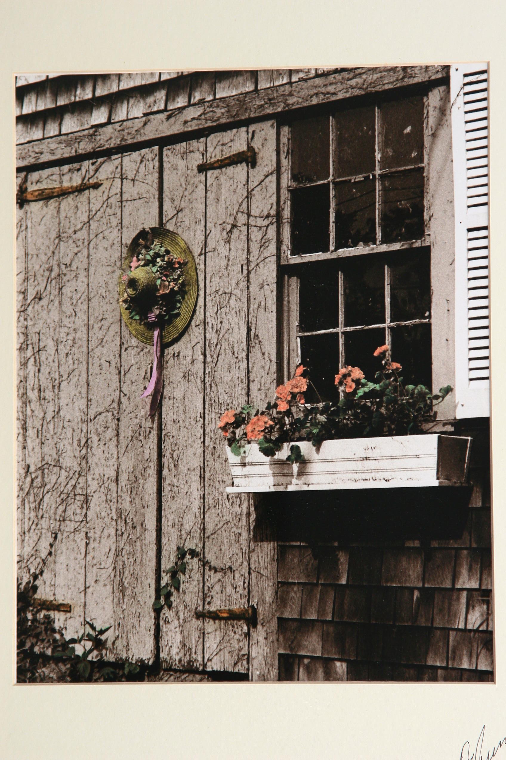 Handcolored sepia print of old barn
