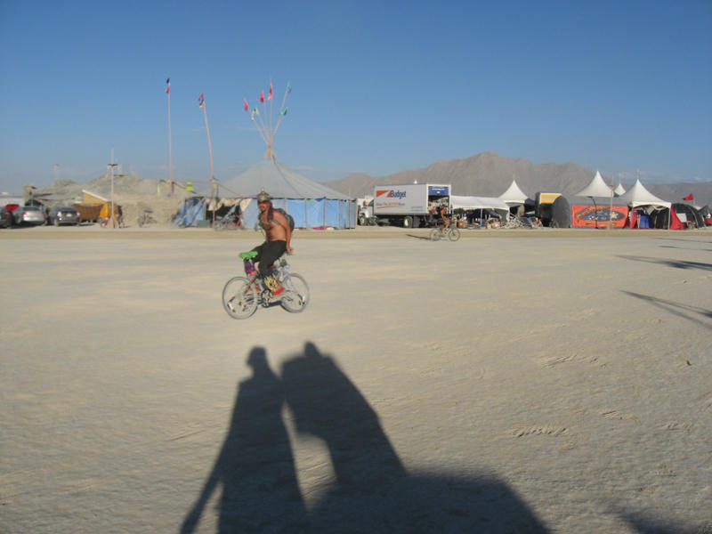 guy riding his bike backwards...