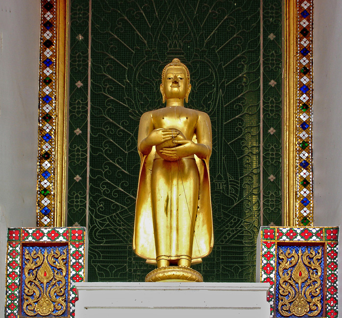 Small Buddha image outside temple
