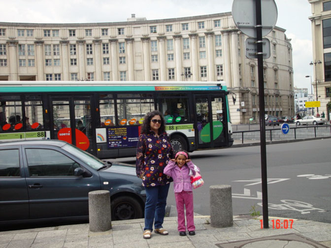 Tourists on a busy Paris street.