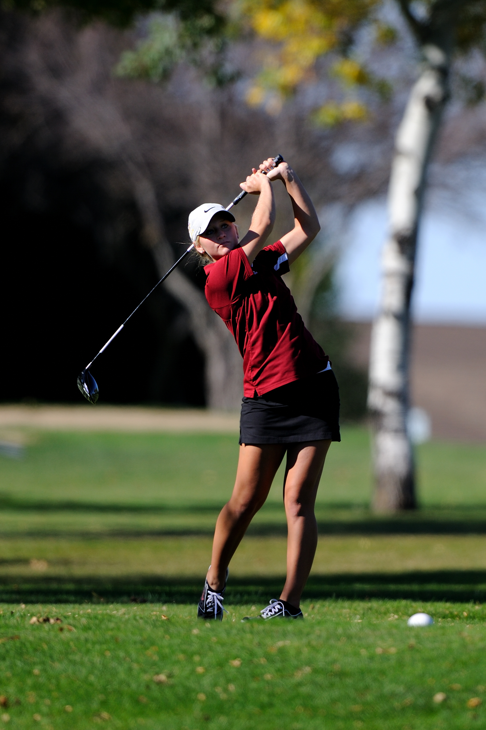 Chelsea follows through on the 14th tee