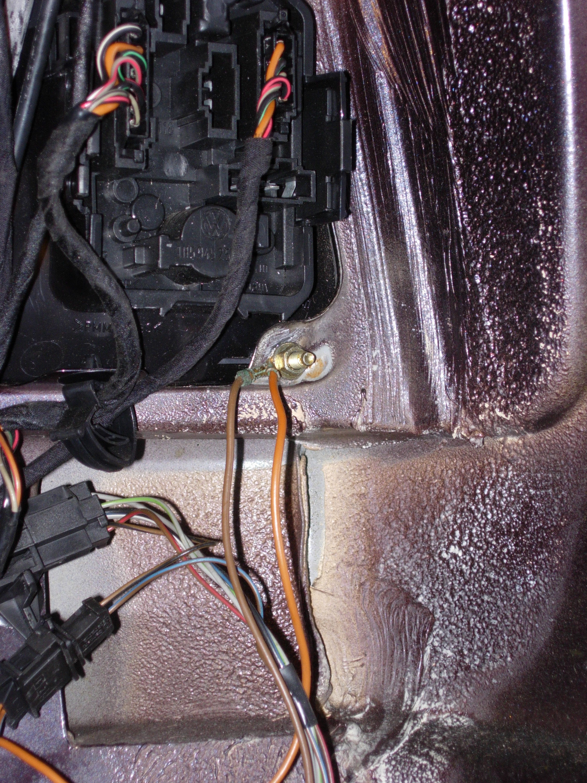 Driver rear fender ground site.jpg