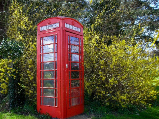 Red telephone booth from pre mobile phone years. 