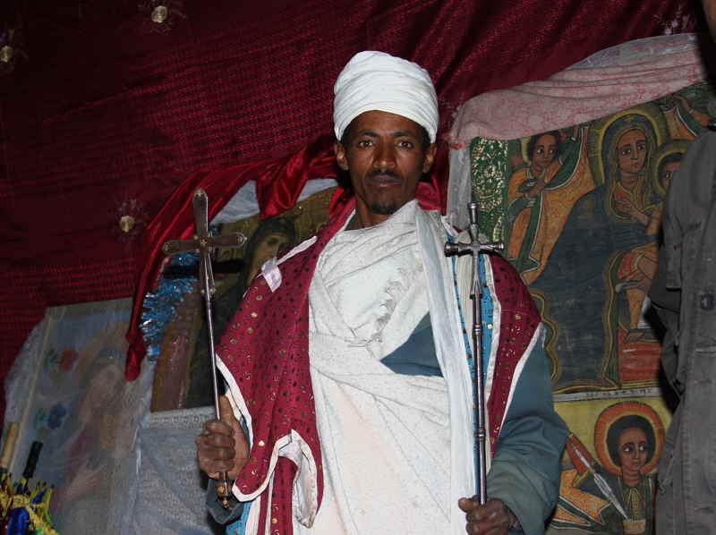 Monk displaying the church treasures, Asheton Maryam