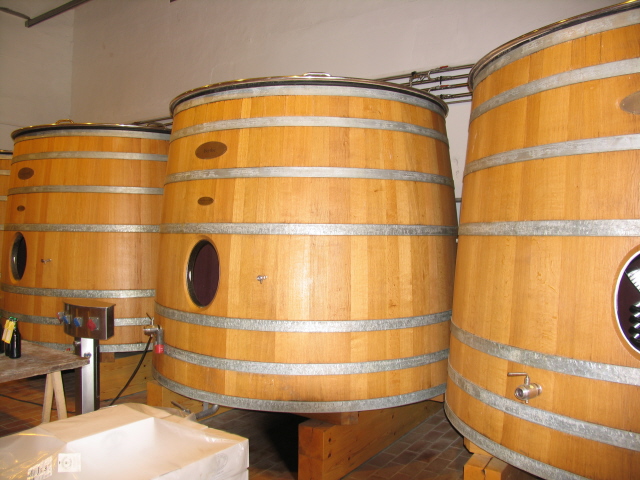 Oak barrels at chateau Pavie Macquin