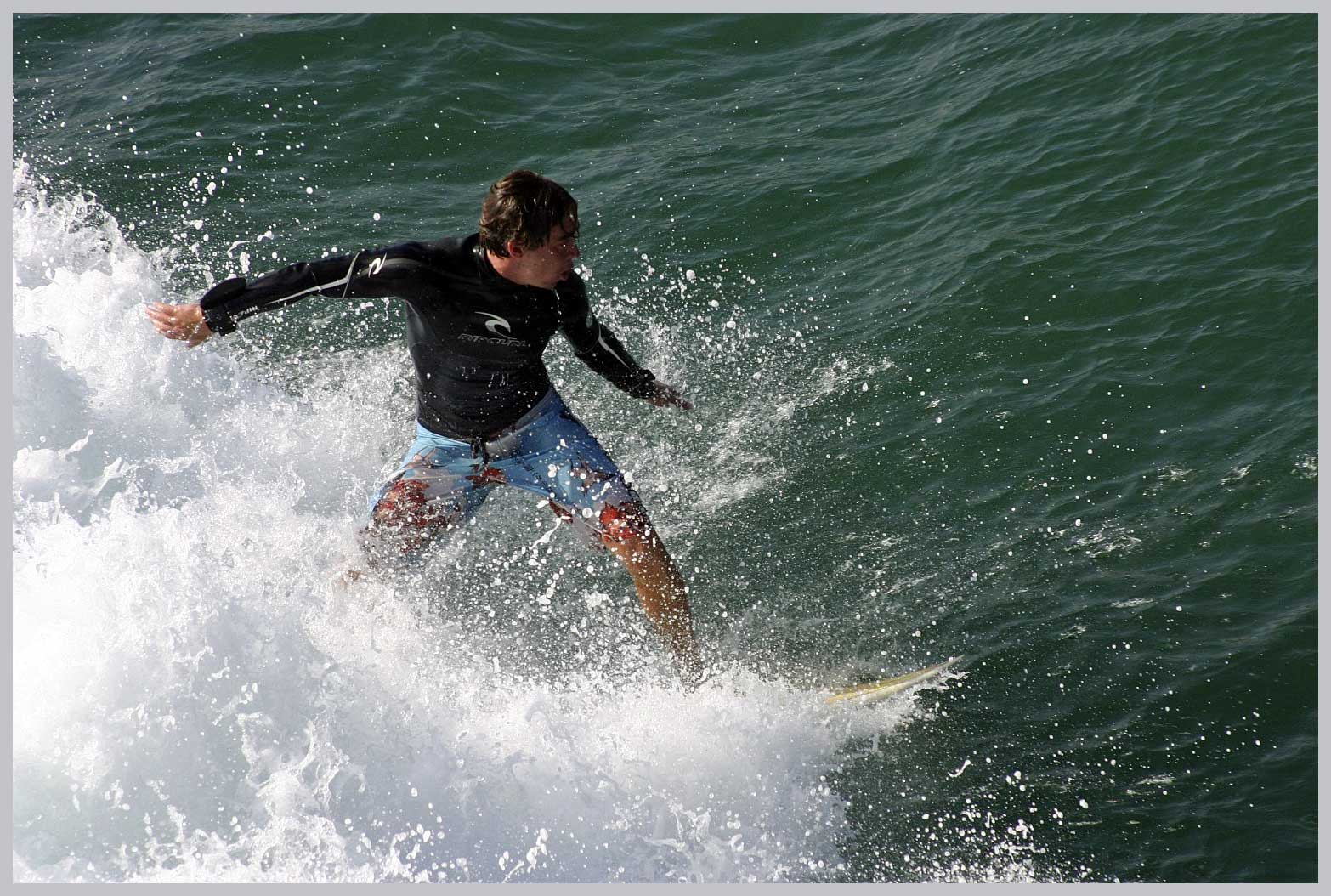 Surfing off the Crystal Pier