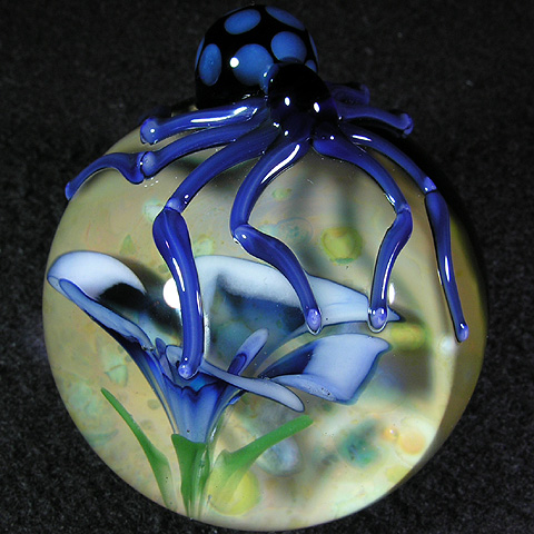 Definitely the coolest marble the Mazets make, a spider perched on a 2-sided marble, protecting both its flower and egg sack!