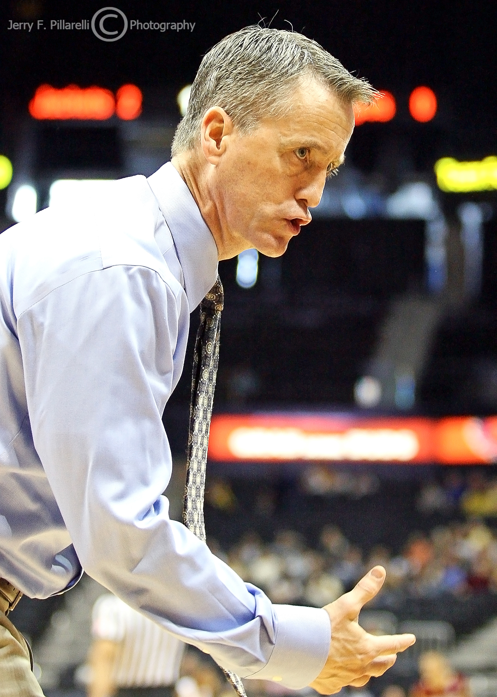 Boston College Eagles Head Coach Steve Donahue talks to his bench players during the action
