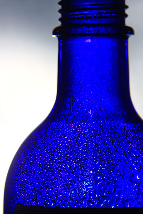 Blue bottle with drops