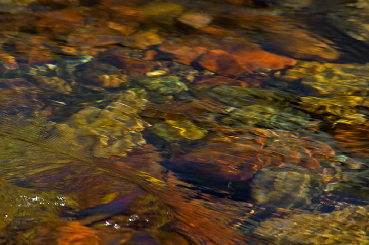 Rocks, sky and fall foliage reflections, Maroon Creek- Snowmass Wilderness, Colorado