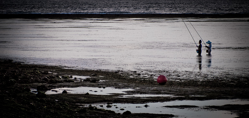Two fishermen and a buoy, Nusa Dua, Bali