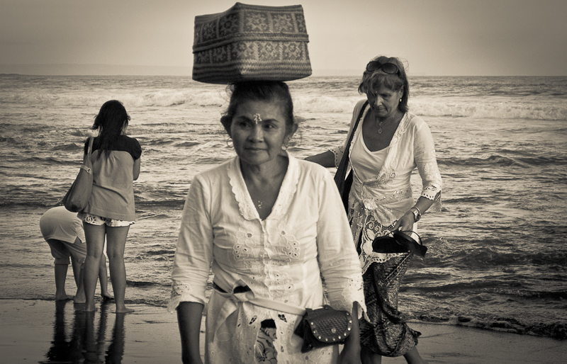 Women on the beach, Tanah Lot Temple, Bali