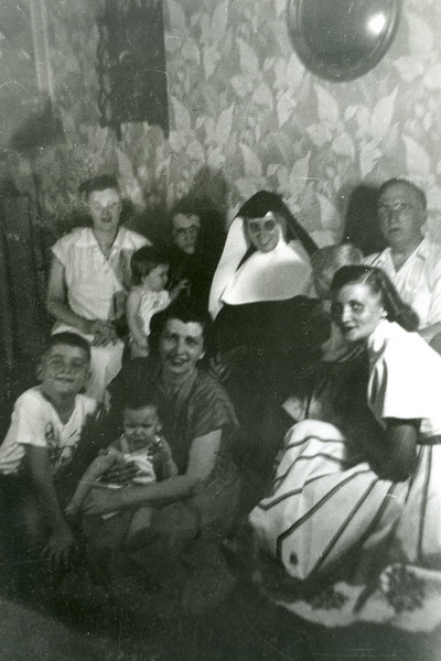 Helen with family at 2916 Riggs Ave, Balto, MD during annual home visit