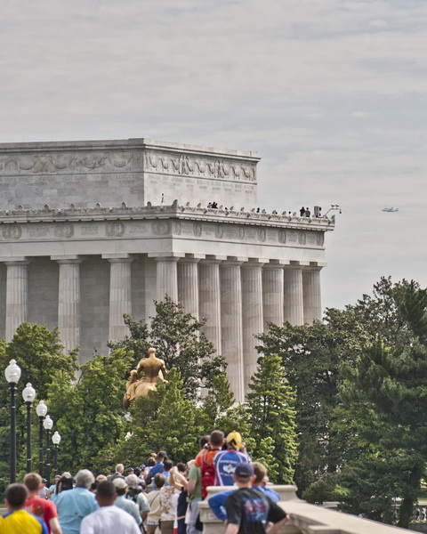 ..... by the Lincoln Memorial, with bronze statue on the Memorial Bridge.