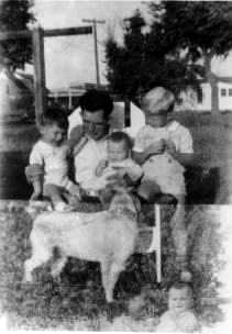 This is a shot of Charlie with his three grandchildren: Richard Mann, Carl Heinz & Ken Heinz. It was taken in Lincoln Nebraska.