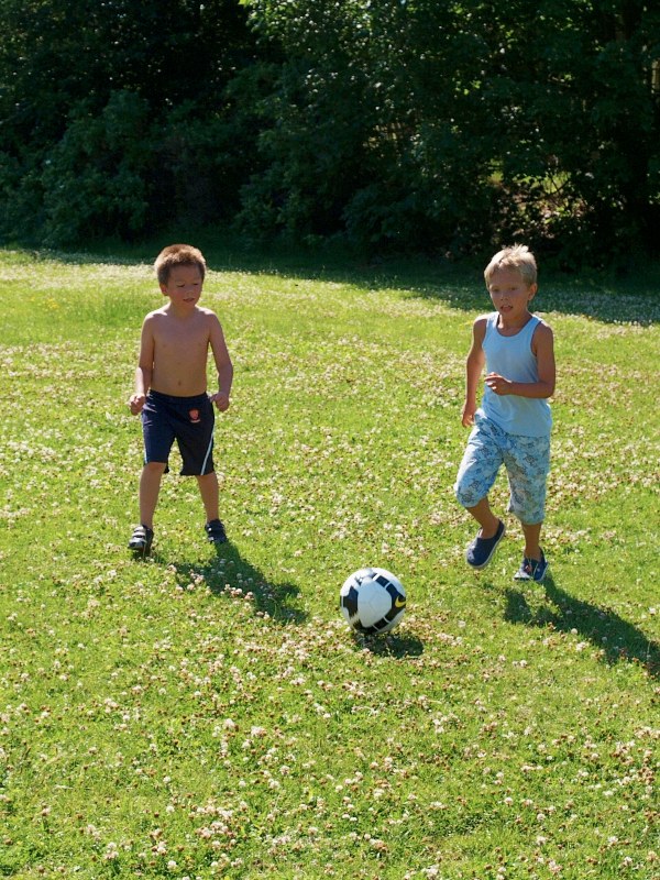 2010-07-20 Oliver and friend playing football