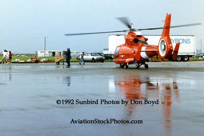 1992 - Coast Guard operations after Hurricane Andrew - HH-65 CG-6540 and volunteers loading supplies