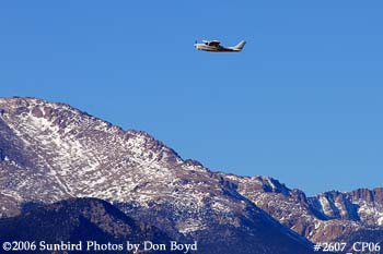 Gregory D. Easton's Cessna T210H N2234R with Pike's Peak in the background private aviation stock photo #2607