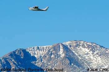 Gregory D. Easton's Cessna T210H N2234R with Pike's Peak in the background private aviation stock photo #2608