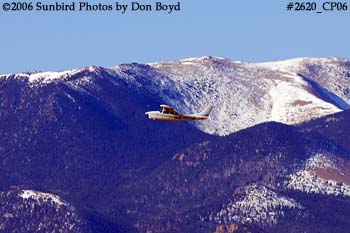 Gregory D. Eastons Cessna T210H N2234R with Pikes Peak in the background private aviation stock photo #2620