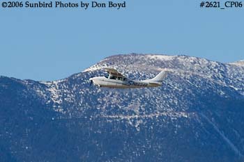 Gregory D. Easton's Cessna T210H N2234R with Pike's Peak in the background private aviation stock photo #2621