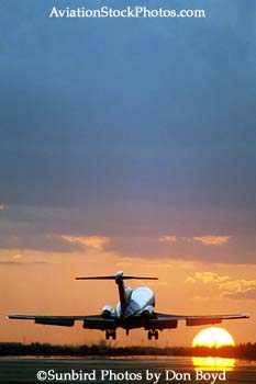 1999 - B727-200 landing on 27-right at Miami International sunset aviation stock photo