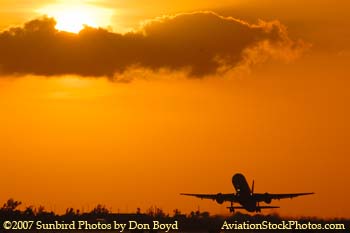 2007 - American Airlines B757-223 takeoff at sunset airline aviation stock photo #3075