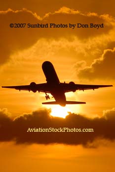 2007 - American Airlines B757-223 takeoff at sunset airline aviation stock photo #3077P