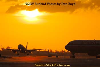 2007 - Northwest Airlines Airbus A-319 takeoff at sunset airline aviation stock photo #3079